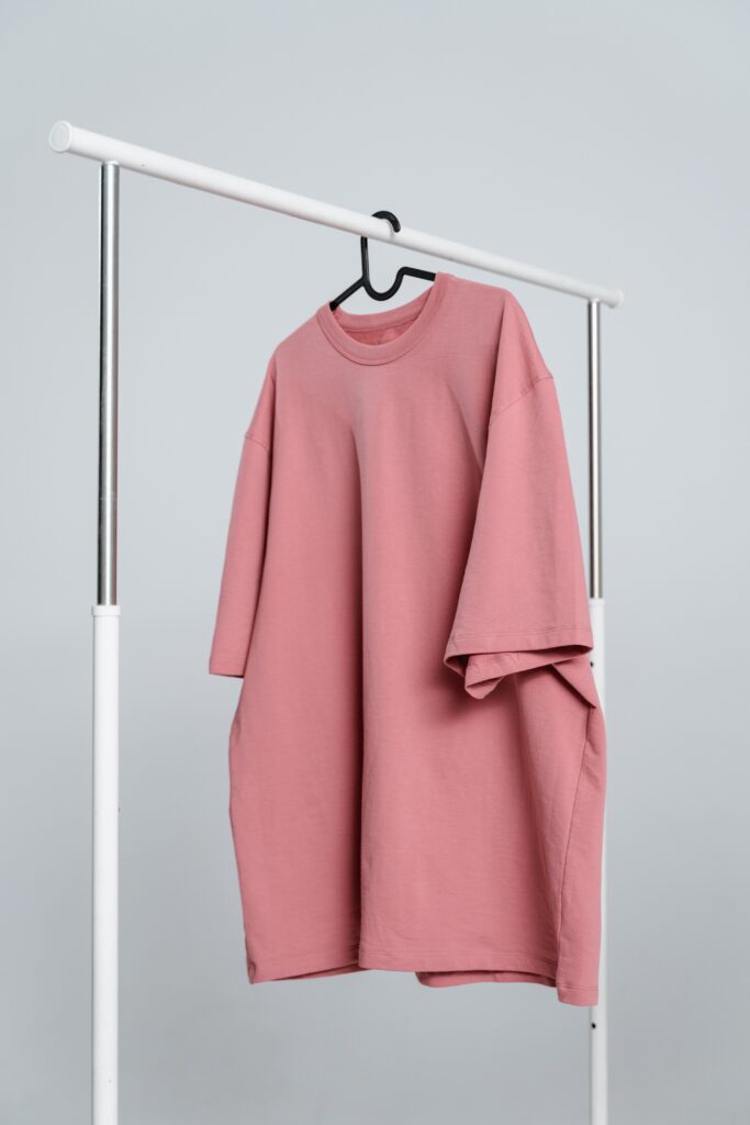 An image featuring a plain, non-branded t-shirt. The t-shirt is shown on a hanger against a neutral background. It's used to introduce the blog post titled 'When is the Best Time for Branding?' The image serves as a metaphor for the importance of branding in different stages of a business, as the plain t-shirt represents a business before branding, and the blog post explores when businesses can best benefit from branding.