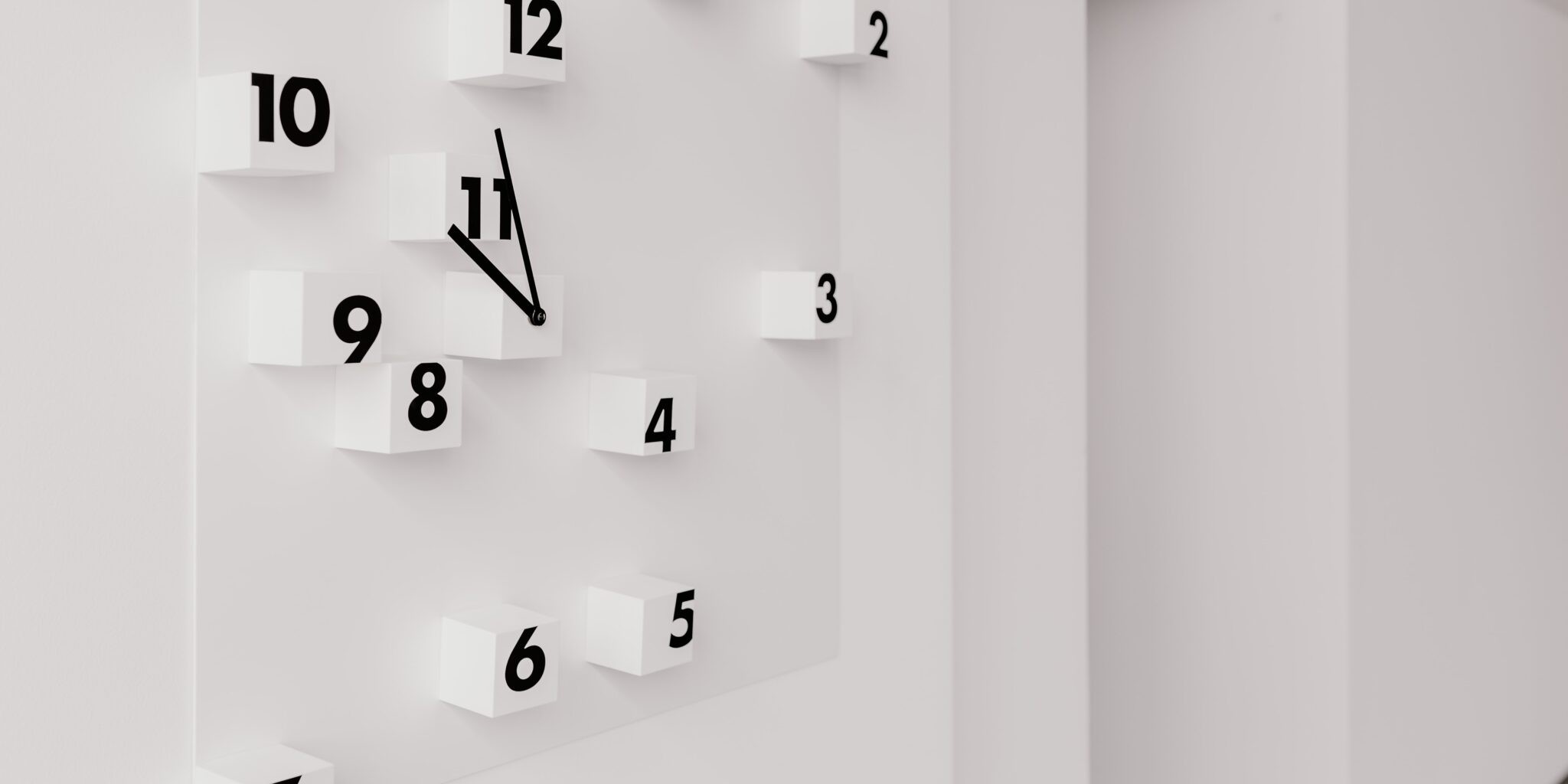 Image shows a clock with scattered numbers as a metaphor for measuring what makes a strong brand