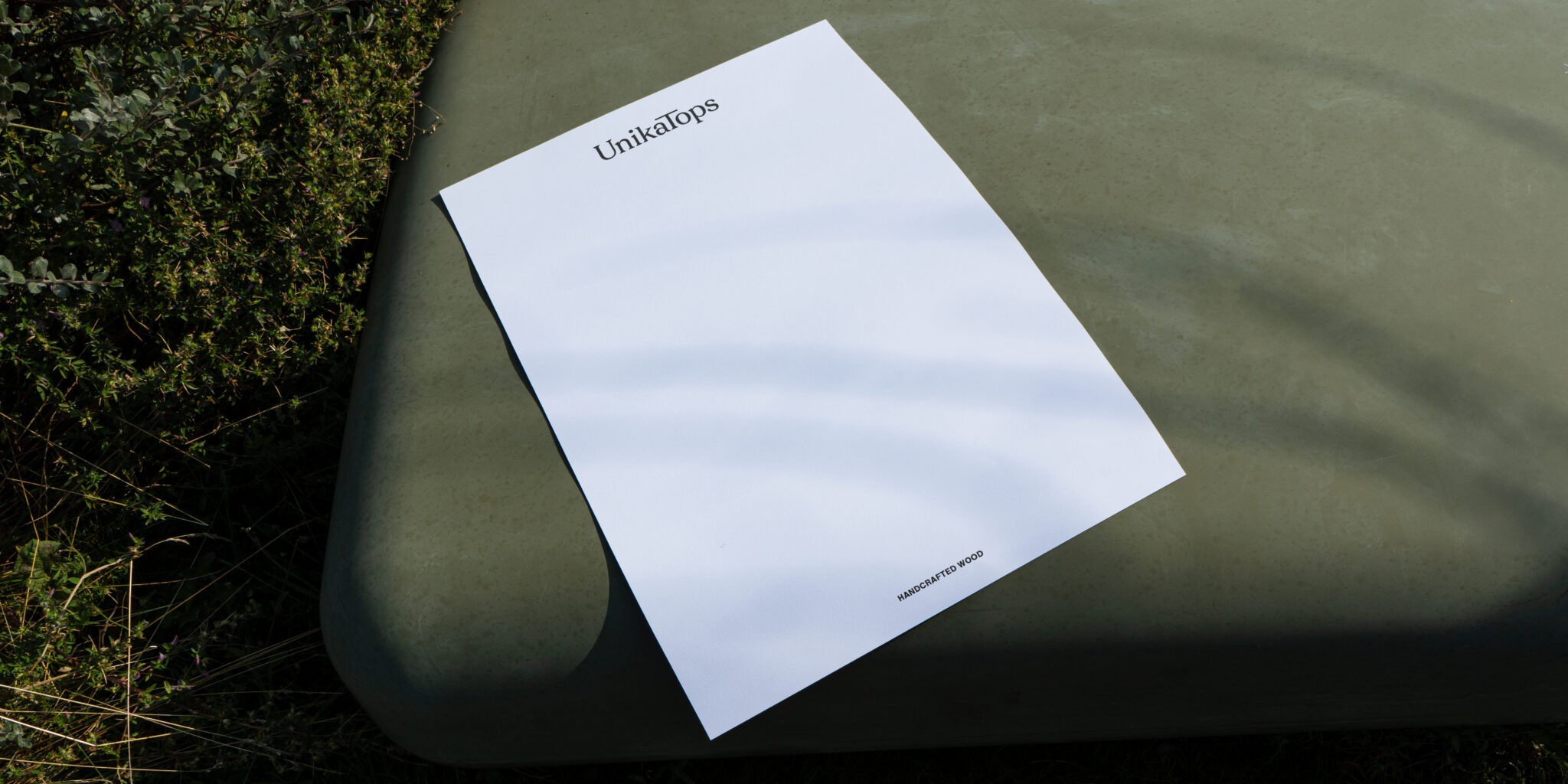 Letterhead design for UnikaTops as an example for brand assets