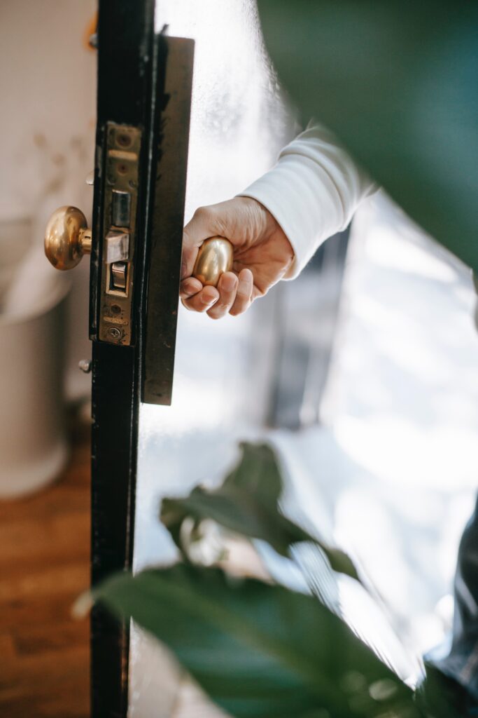 The image shows a door being opened as a metaphor and intro for a blog post about employer branding.