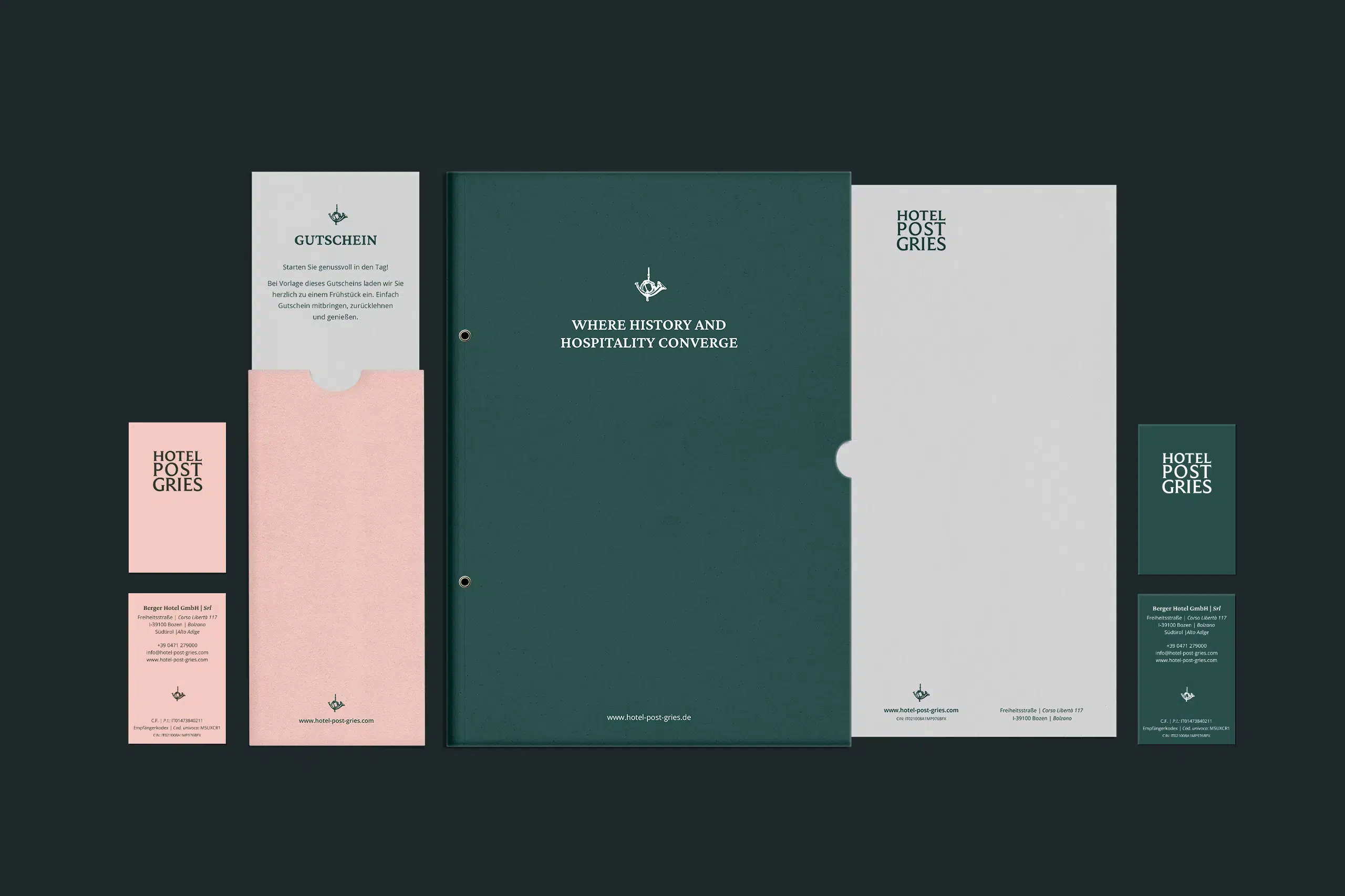 Stationery design for Hotel Post Gries, including business cards on green and pale pink board, a folder featuring the new tagline, and a voucher in a sleeve.