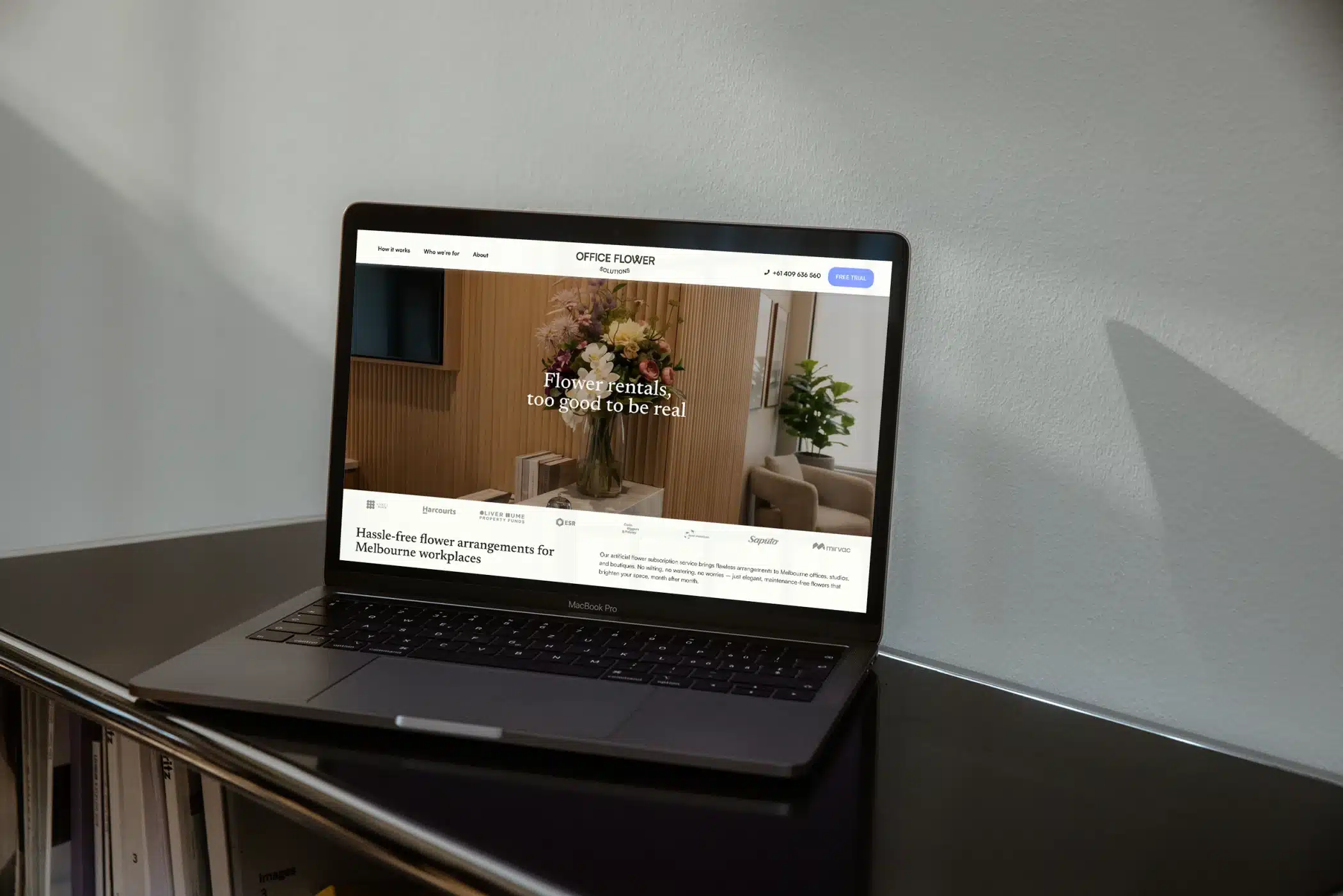 Floral brand identity for Office Flower Solutions — website homepage design showing how the visual identity applies to digital.