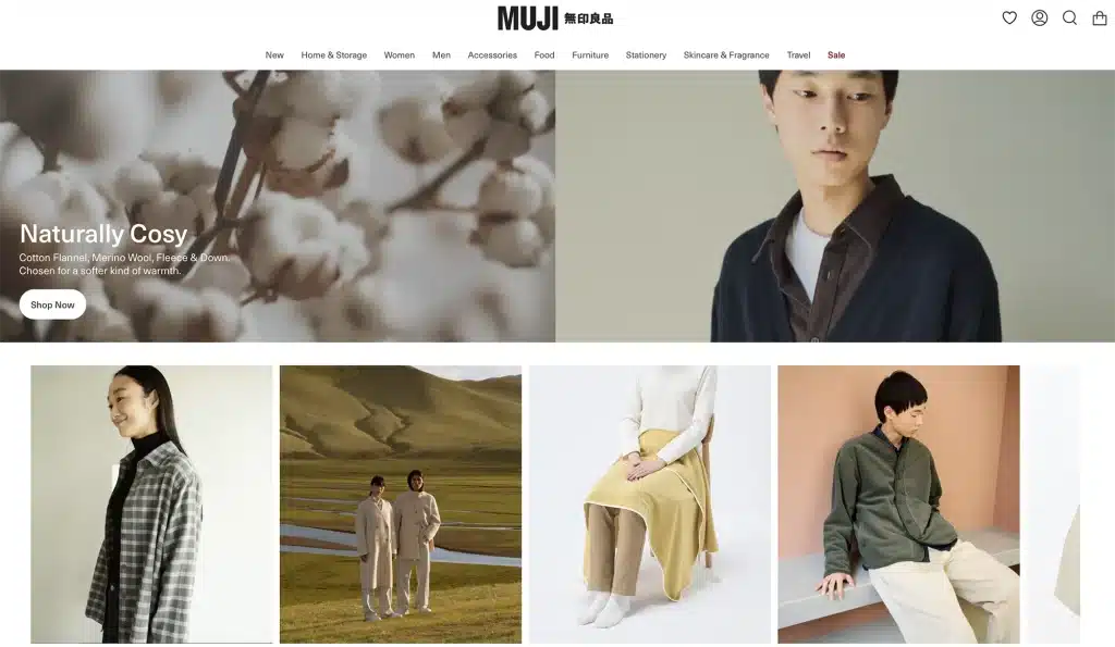 Muji homepage featuring minimalist design with neutral earth tones, clean typography, and product photography showcasing simple clothing and natural materials with "Naturally Cosy" headline