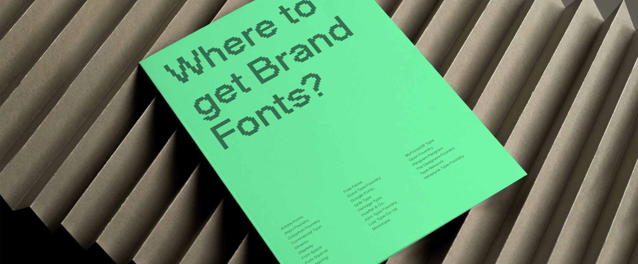 A mockup showing an A4 poster that reads "where to get brand fonts?". This is the intro to my article "The 25 Best Websites to Find Fonts for Your Brand"