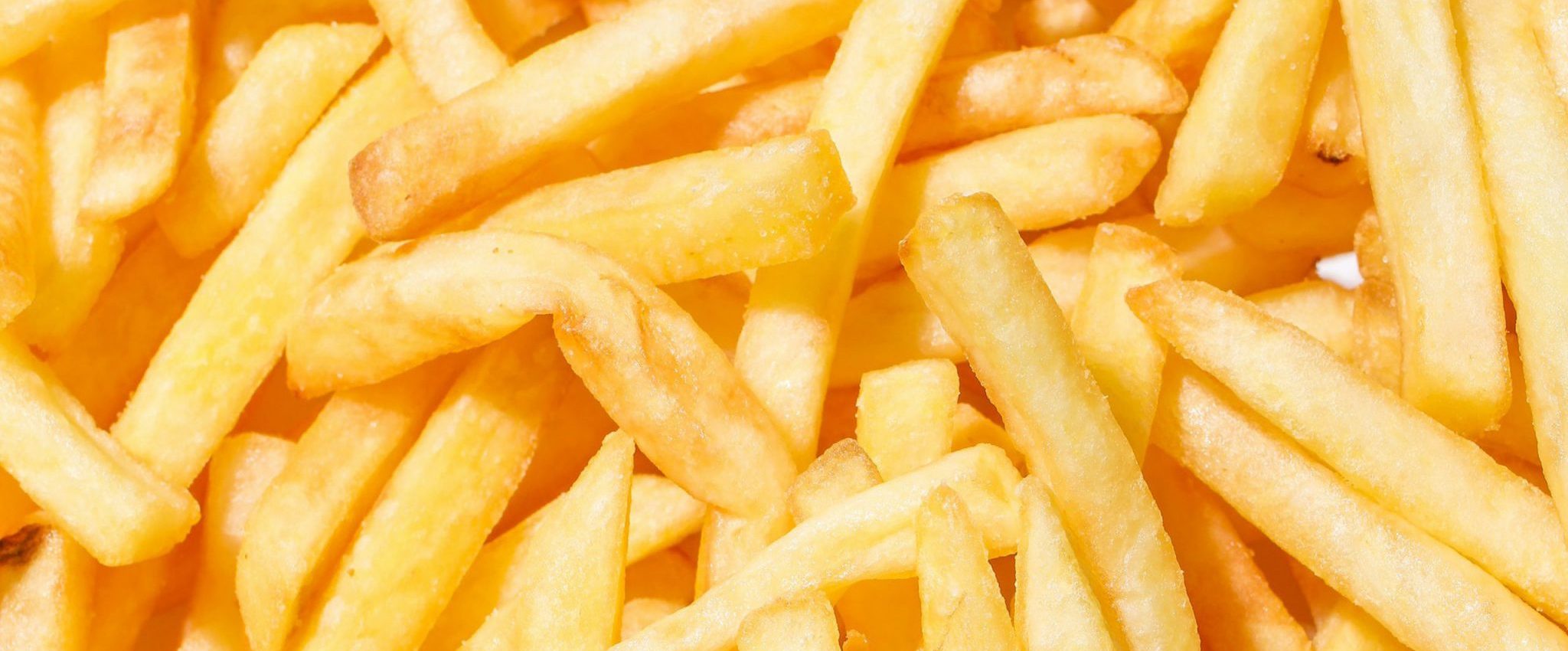 Image shows fries ton introduce the article "How Ogilvy Used Psychology to Increase Sales of KFC French Fries by 56%"