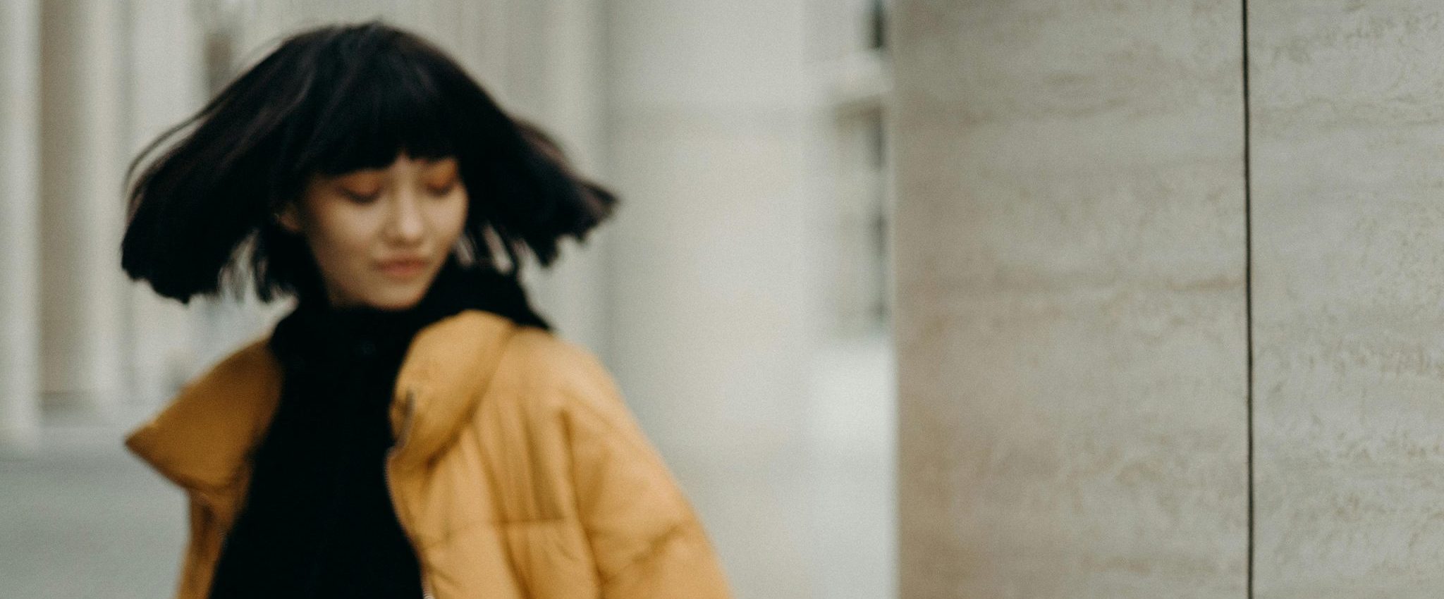 image of a blurry woman as an intro to the exploration "what makes a brand recognisable?"